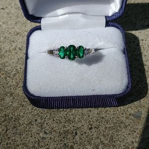 Delightful deep green emerald ring